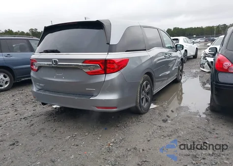 2018 Honda Odyssey Touring from USA, damaged, VIN 5FNRL6H81JB066846